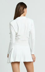 Cannes Mini Dress - Jersey Wrap Hardware Detail Flounce Skirt Dress in Off White