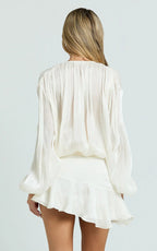 Carmela Mini Dress - Long Sleeve Tie Neck Ruffle Skirt Dress in Off White