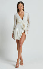 Three Of Us Mini Dress - Long Sleeve Wrap Dress in White Sequin